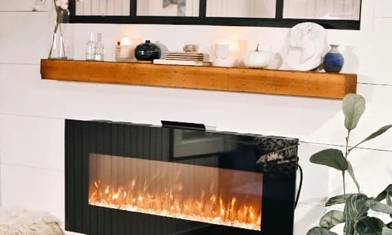 Co postawić na kominku? 10 inspiracji, które odmieniają wnętrze